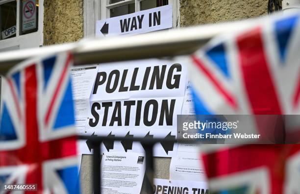 Union flag bunting is seen outside Canford Cliffs Library Polling station, as people go to the polls in the local elections, on May 04, 2023 in...
