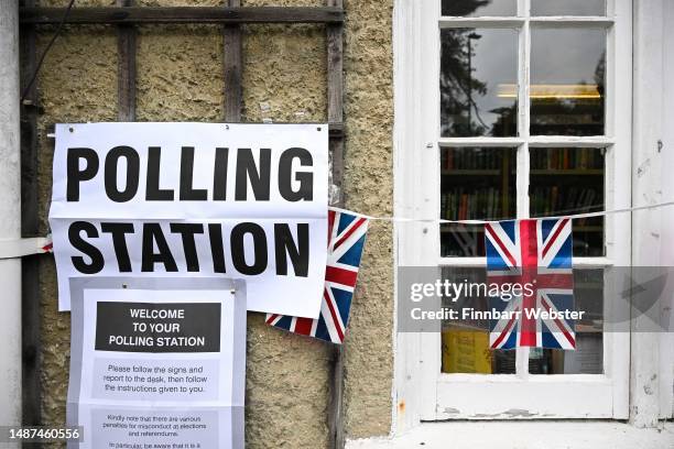 Polling station signs are seen outside Canford Cliffs Library Polling station, as people go to the polls in the local elections, on May 04, 2023 in...