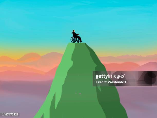 illustration of man with disability sitting in wheelchair on mountain peak - human representation stock illustrations