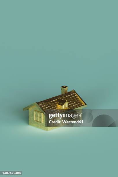 three dimensional render of gold colored house standing against turquoise background - posh stock illustrations