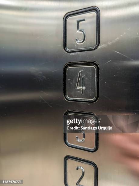 close-up of elevator buttons - brussles lift stock-fotos und bilder