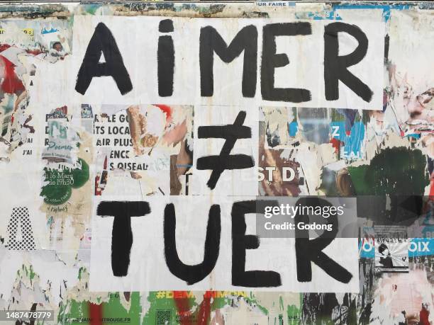 Street art protesting against violence against women in Paris, France.