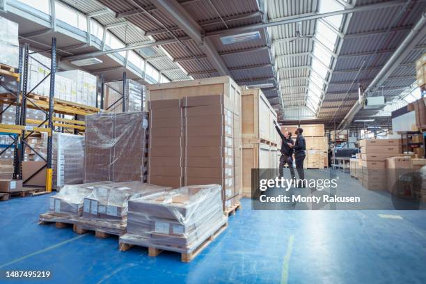 products in warehouse ready for dispatch in factory - industrial plant stock pictures, royalty-free photos & images