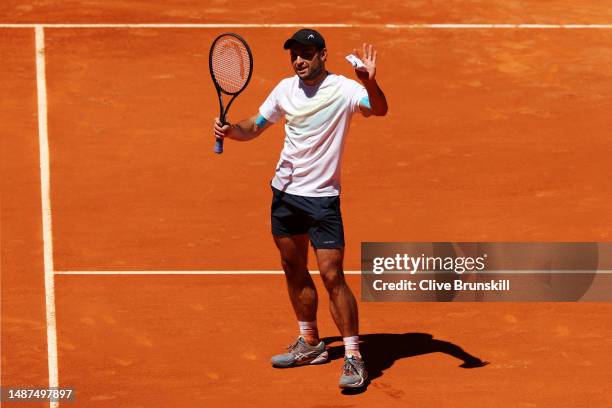 Aslan Karatsev acknowledges the crowd after winning match point against Zhizhen Zhang of People's Republic of China during the Men's Quarter Final...