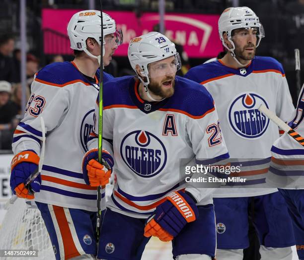 Ryan Nugent-Hopkins. Leon Draisaitl and Evan Bouchard of the Edmonton Oilers react after Draisaitl scored a third-period power-play goal, his third...