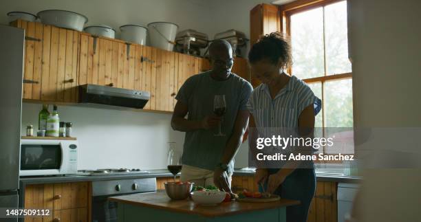 home, cooking and happy black couple in kitchen for lunch, meal prep and quality time together. relationship, happiness and man and woman prepare food, vegetables and healthy dinner in apartment - couple in kitchen stock pictures, royalty-free photos & images