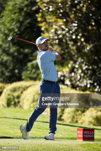 Austin Cook of the United States plays his shot from the sixth tee during the first round of the Wells Fargo Championship at Quail Hollow Country...