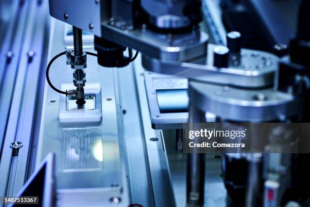 assembling smartphone at production line - product development stockfoto's en -beelden