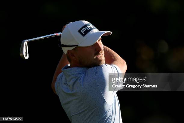 Austin Cook of the United States plays his shot from the fourth tee during the first round of the Wells Fargo Championship at Quail Hollow Country...