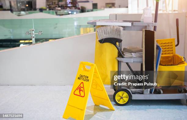 cleaning tools cart wait for cleaning,yellow mop bucket and set of cleaning equipment - hospital alarm stock pictures, royalty-free photos & images