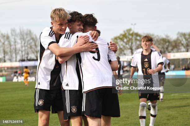 Christian Prenaj of Germany celebrates the third goal with Leopold Schmid of Germany and Alexander Staff of Germany during the international friendly...