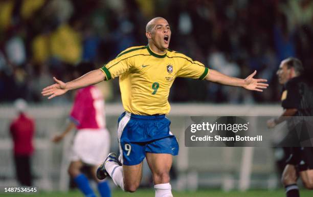 Brazil striker Ronaldo celebrates after scoring during the 4-1 round of 16 match against Chile at the 1998 FIFA World Cup Finals at Parc des Princess...