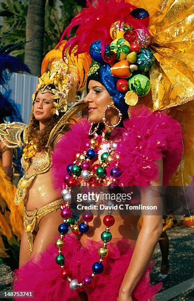 women in brazilian carnival costumes at lemon festival parade. - traditional lemon festival on the french riviera stock pictures, royalty-free photos & images