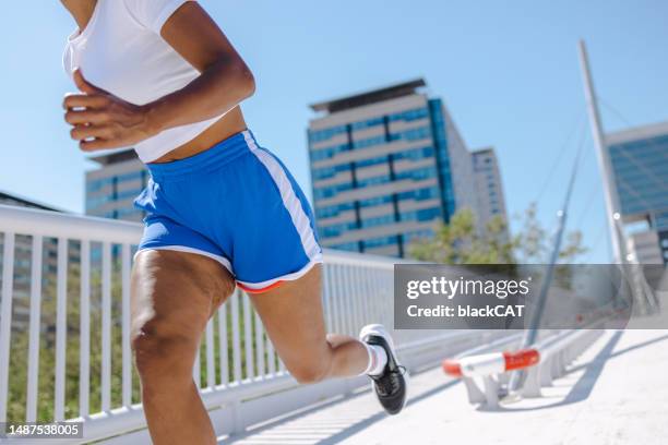 fitness woman exercising in the city - cellulite stock pictures, royalty-free photos & images