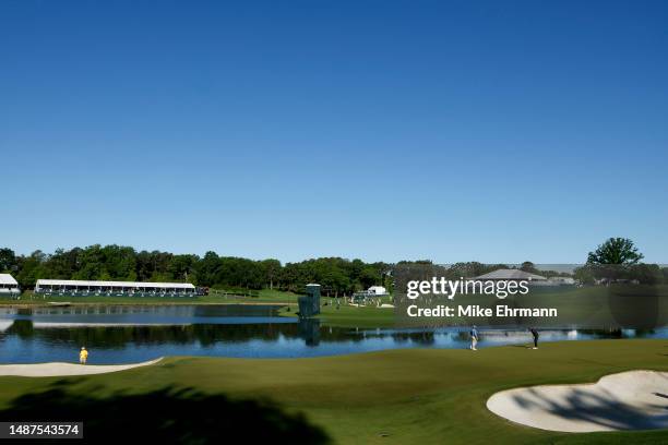 General view is seen as Sahith Theegala of the United States putts on the 14th green during the first round of the Wells Fargo Championship at Quail...