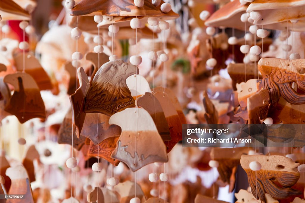 Souvenirs displayed outside shop in Oriental Village shopping centre, Pantai Kok.