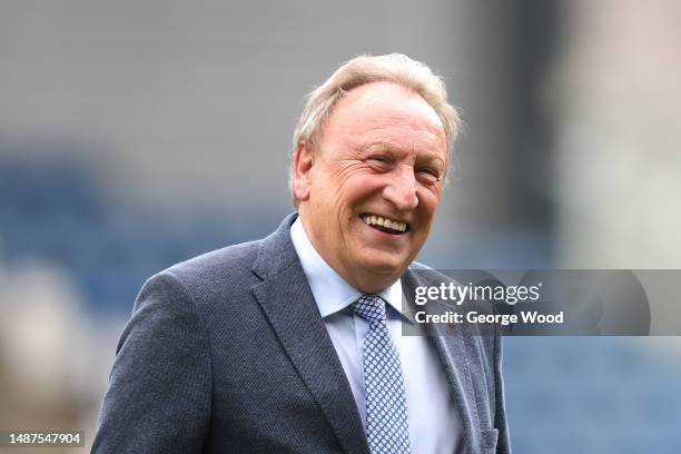 Neil Warnock, Manager of Huddersfield Town, looks on as they inspect the pitch prior to the Sky Bet Championship between Huddersfield Town and...