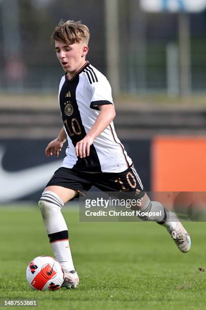Lennart Karl of Germany runs with the ball during the international friendly match between U15 Netherlands and U15 Germany at Achilles 1894 Stadium...
