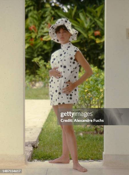 Actress Leslie Caron wears a Polka dot outfit while at Jamaica in 1963.