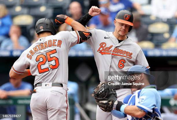 Anthony Santander of the Baltimore Orioles is congratulated by Ryan Mountcastle after hitting a 2-run home run during the 1st inning of the game...