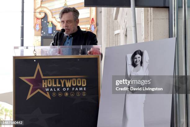 Mark Hamill speaks onstage during the ceremony for Carrie Fisher being honored posthumously with a Star on the Hollywood Walk of Fame on May 04, 2023...