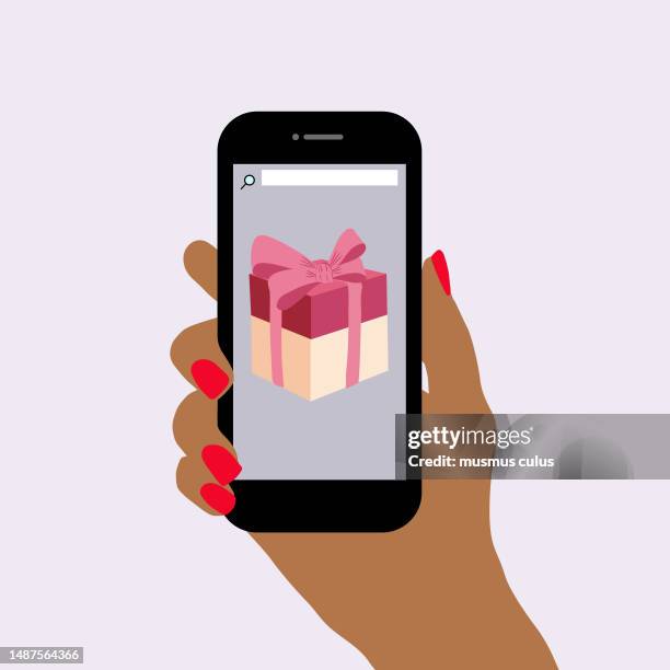 hands holding smartphone with gift on screen - illustration - computer app store stock illustrations