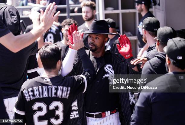 Eloy Jimenez of the Chicago White Sox is congratulated by a#23 of the Chicago White Sox following a two run home run during the third inning of a...