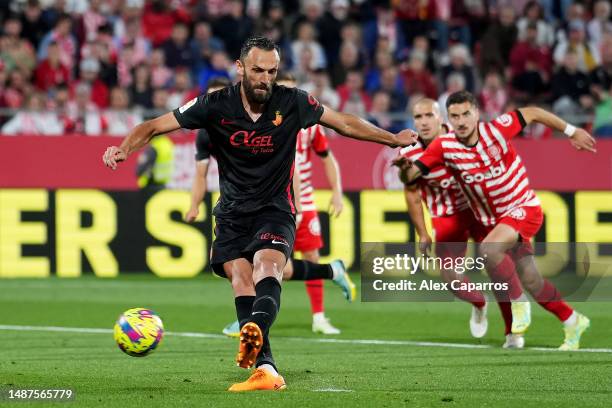Vedat Muriqi of RCD Mallorca scores the team's first goal from the penalty spot during the LaLiga Santander match between Girona FC and RCD Mallorca...