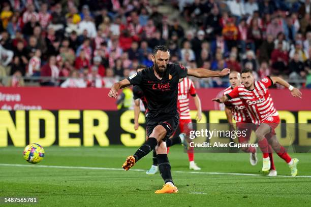 Vedat Muriqi of RCD Mallorca scores the team's first goal from the penalty spot during the LaLiga Santander match between Girona FC and RCD Mallorca...
