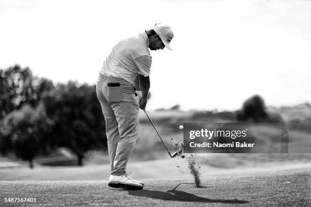 Matthieu Pavon of France plays their second shot on the 14th hole during Day One of the DS Automobiles Italian Open at Marco Simone Golf Club on May...