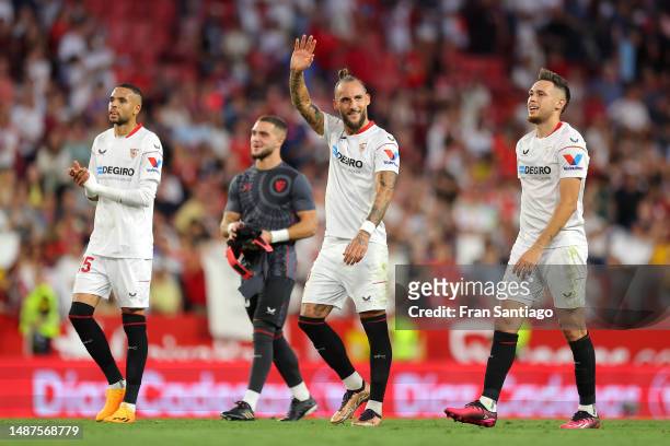 Yousseff En-Nesyri, Nemanja Gudelj and Lucas Ocampos of Sevilla FC acknowledge the fans after the LaLiga Santander match between Sevilla FC and RCD...