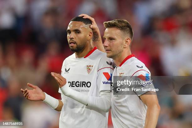Yousseff En-Nesyri interacts with Ivan Rakitic of Sevilla FC as they applaud their fans after the LaLiga Santander match between Sevilla FC and RCD...