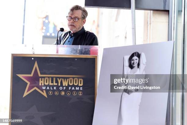 Mark Hamill speaks onstage during the ceremony for Carrie Fisher being honored posthumously with a Star on the Hollywood Walk of Fame on May 04, 2023...