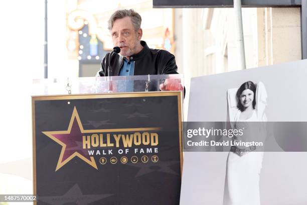 Mark Hamill speaks onstage during the ceremony for Carrie Fisher being honored posthumously with a Star on the Hollywood Walk of Fame on May 04, 2023...