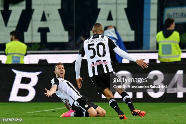 Sandi Lovric of Udinese Calcio celebrates with teammate Rodrigo Becao after scoring the team's first goal during the Serie A match between Udinese...