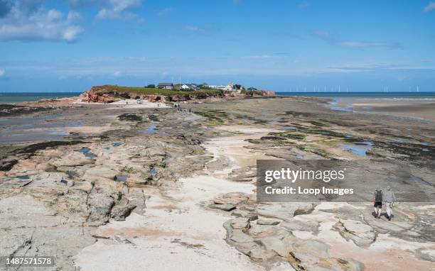 Pathway over the rocks from Middle Eye down to Hilbre Island on the Wirral Penninsula.