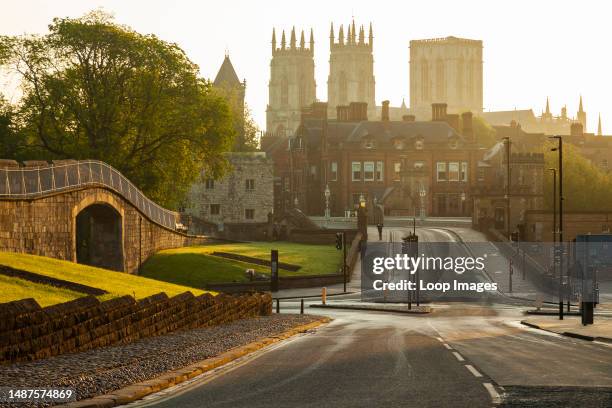 York Minster towers above the city at sunrise.