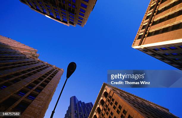 low angle view of high-rise buildings, financial district. - high and low stockfoto's en -beelden
