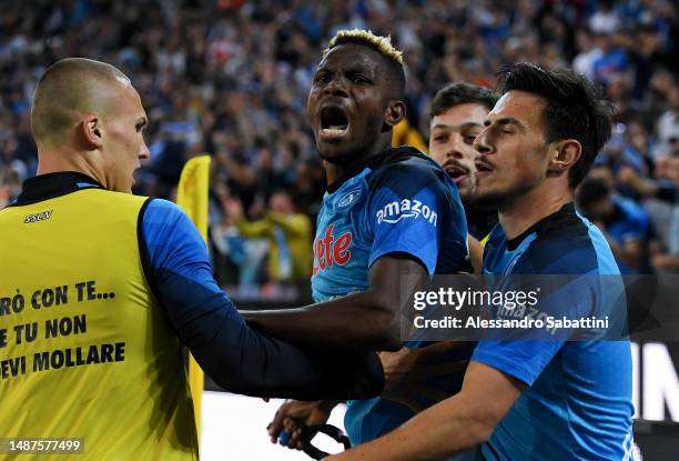 Victor Osimhen of SSC Napoli celebrates with teammates after scoring the team's first goal during the Serie A match between Udinese Calcio and SSC...