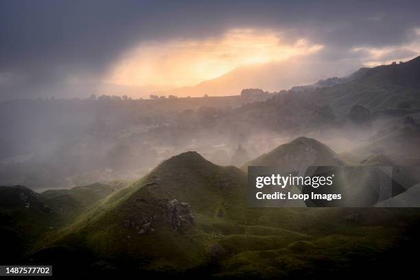 Fog clearing over Llangattock Escarpment in the Brecon Beacons.