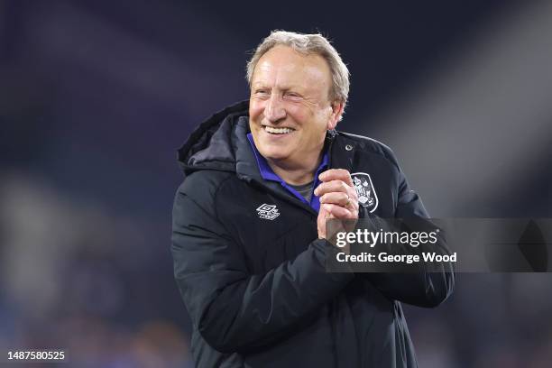 Neil Warnock, Manager of Huddersfield Town, reacts after the team's victory in the Sky Bet Championship between Huddersfield Town and Sheffield...