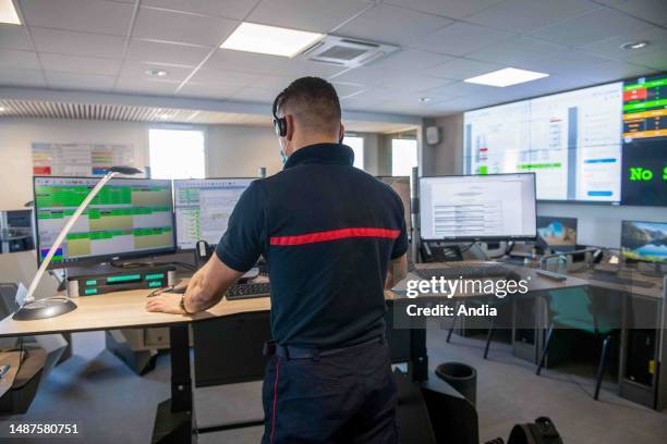 Fireman in the premises of the 'SDIS 26', Fire and Emergency Service of the Drome department: Fire Department dispatch center, fireman with a headset...