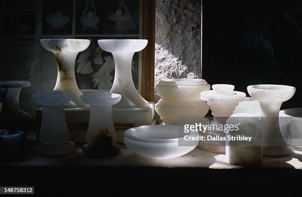 alabaster products for sale in the medieval town of volterra. - volterra fotografías e imágenes de stock