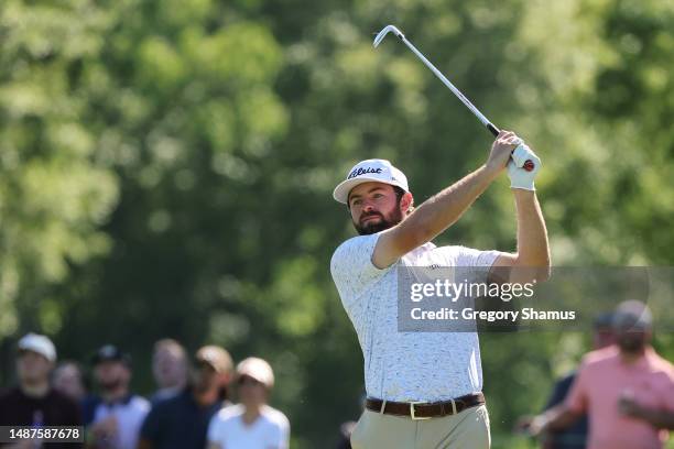 Cameron Young of the United States plays his shot from the ninth tee during the first round of the Wells Fargo Championship at Quail Hollow Country...