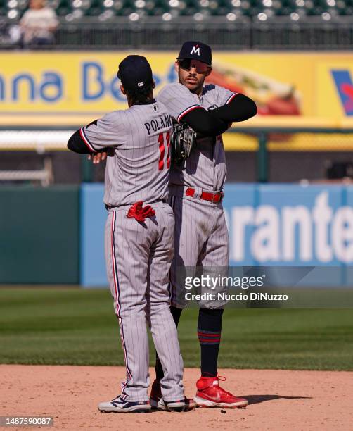 Jorge Polanco and Carlos Correa of the Minnesota Twins celebrate their team win over the Chicago White Sox at Guaranteed Rate Field on May 04, 2023...