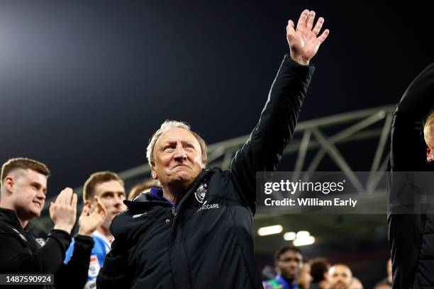 Neil Warnock the manager of Huddersfield Town gestures to the fans at full time during the Sky Bet Championship game between Huddersfield Town and...