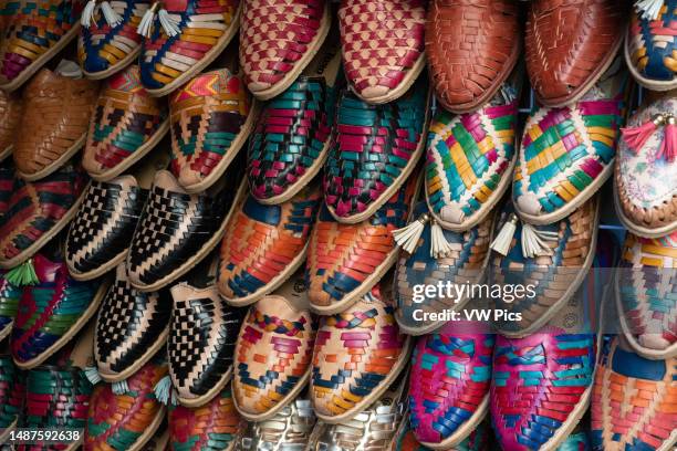 Colorful leather shoes for sale in a shop in Oaxaca, Mexico.