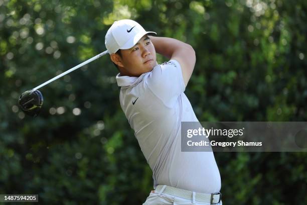 Tom Kim of South Korea plays his shot from the 12th tee during the first round of the Wells Fargo Championship at Quail Hollow Country Club on May...