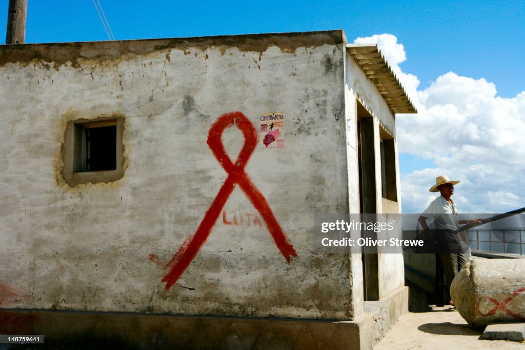 AIDs sign on gatekeeper's house, Ilha De Mozambique.