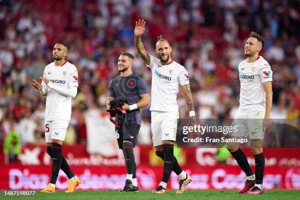 Nemanja Gudelj, Lucas Ocampos and Youssef En-Nesyri of Sevilla FC celebrate after the LaLiga Santander match between Sevilla FC and RCD Espanyol at...